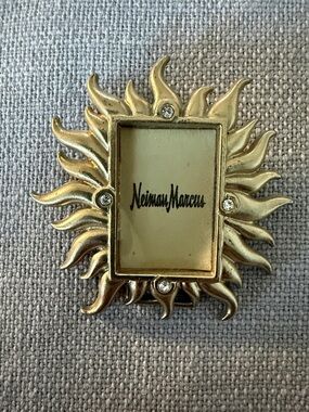 Neiman Marcus Gold Sunburst Frame with Rhinestones. Easel and clip on back.